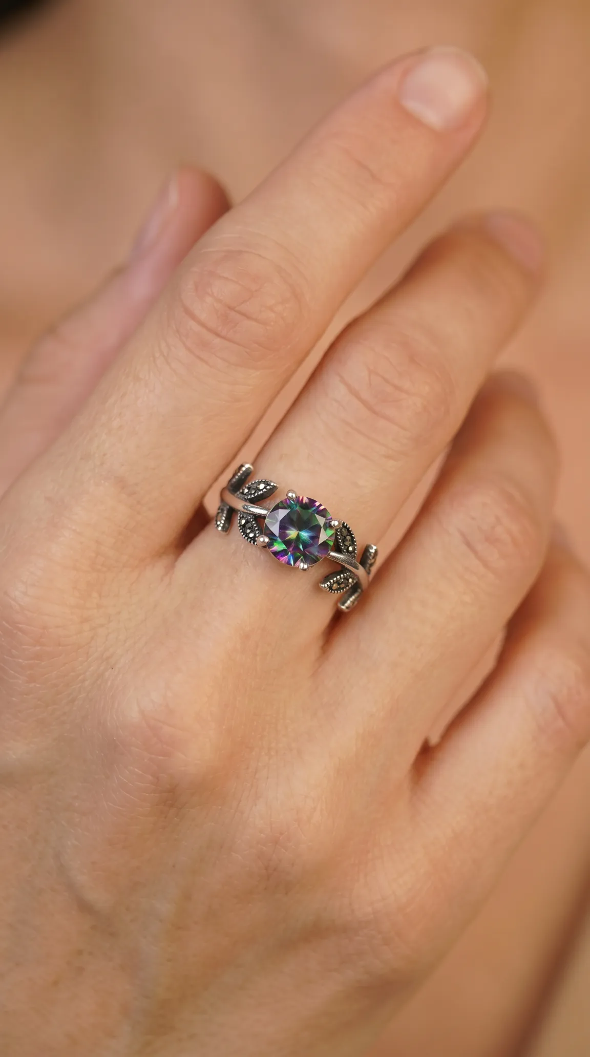 Vintage sterling silver ring with mystic topaz gemstone and marcasite leaf design