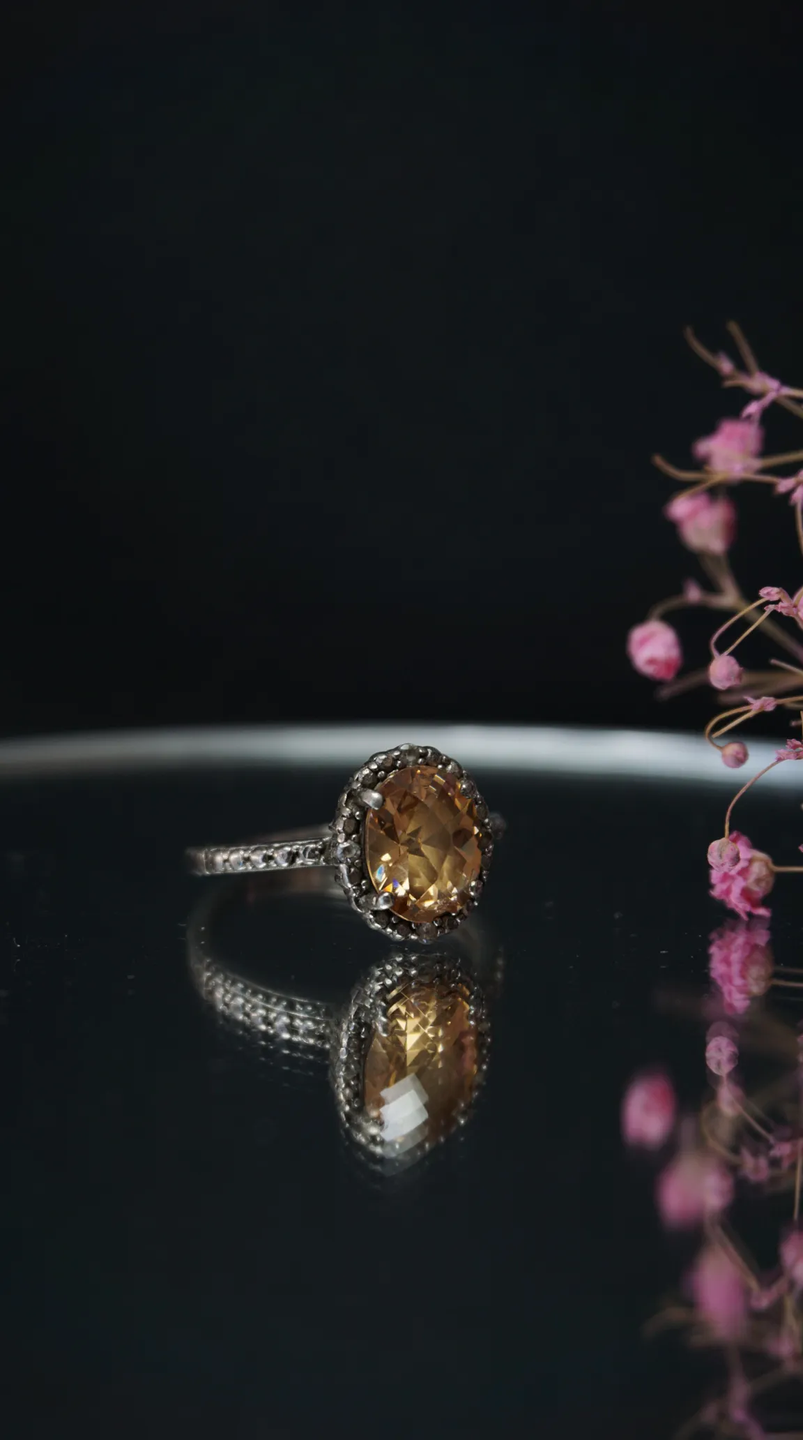 Vintage sterling silver ring with oval citrine gemstone and intricate setting