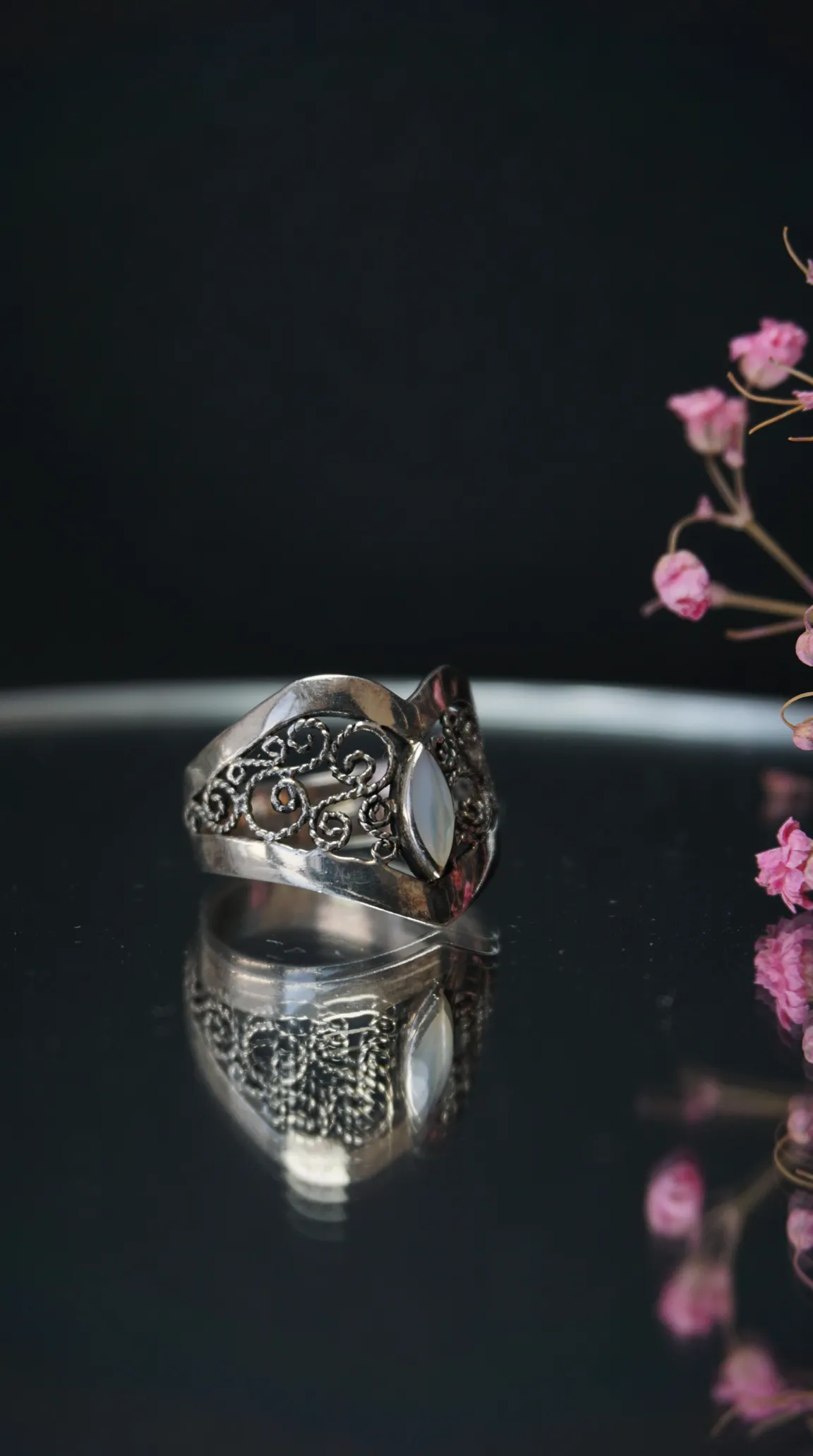 Vintage sterling silver filigree ring with marquise mother of pearl stone
