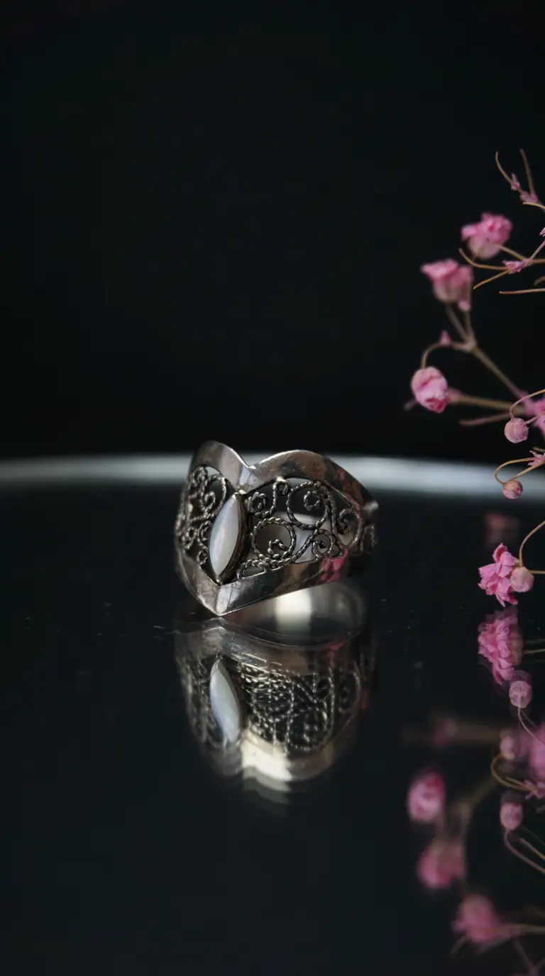 Vintage silver filigree ring with oval mother of pearl stone