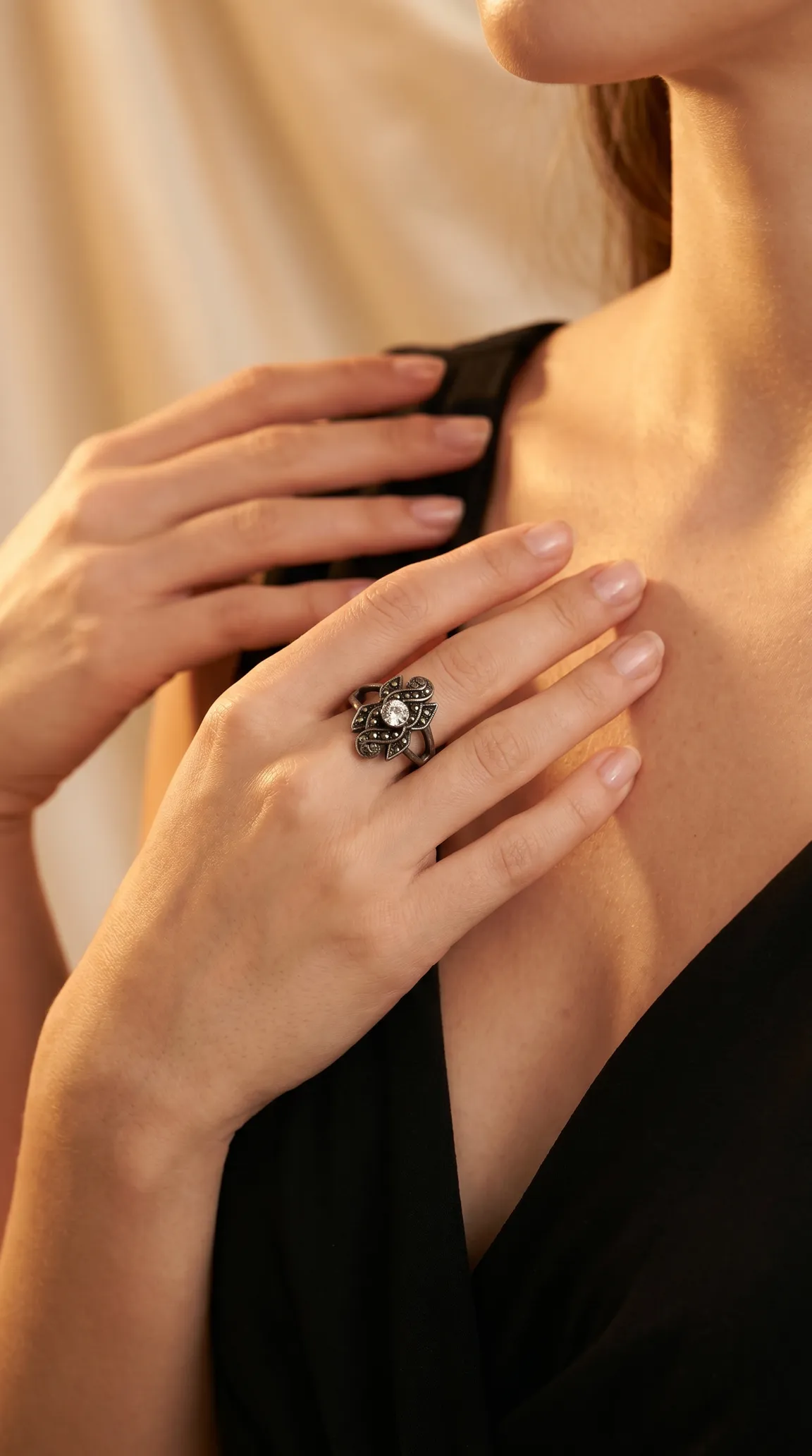 Vintage marcasite and clear crystal ring on a woman's hand