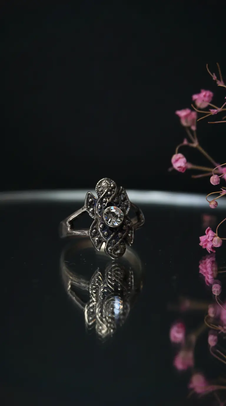 vintage ornate silver floral ring with clear crystal gemstone