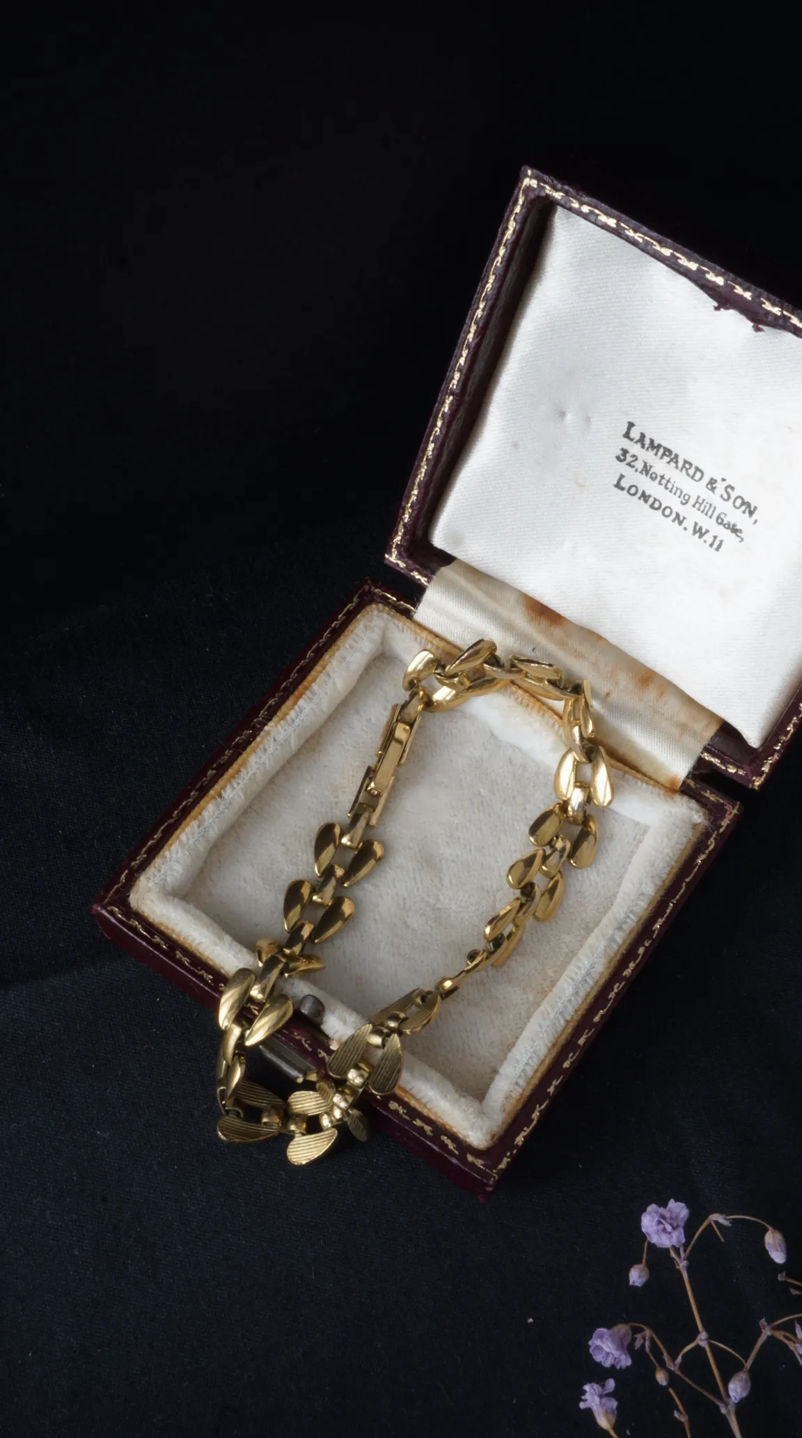 Vintage gold leaf link bracelet in open red Lampard & Son Notting Hill Gate London jewelry box