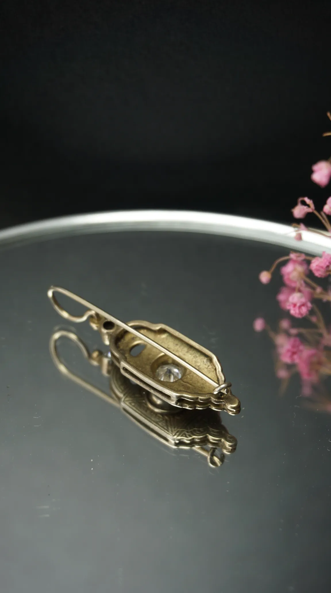 Vintage gold-tone ornate brooch with clear crystal, antique jewelry