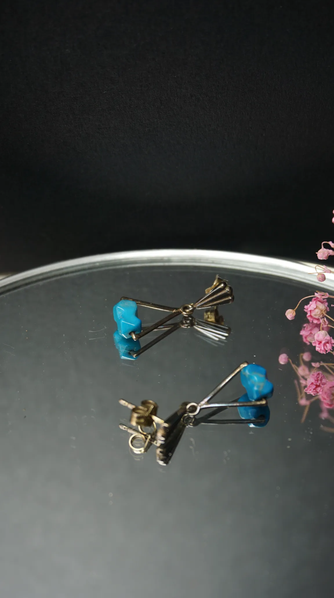 Vintage silver-tone dangle earrings with turquoise stones