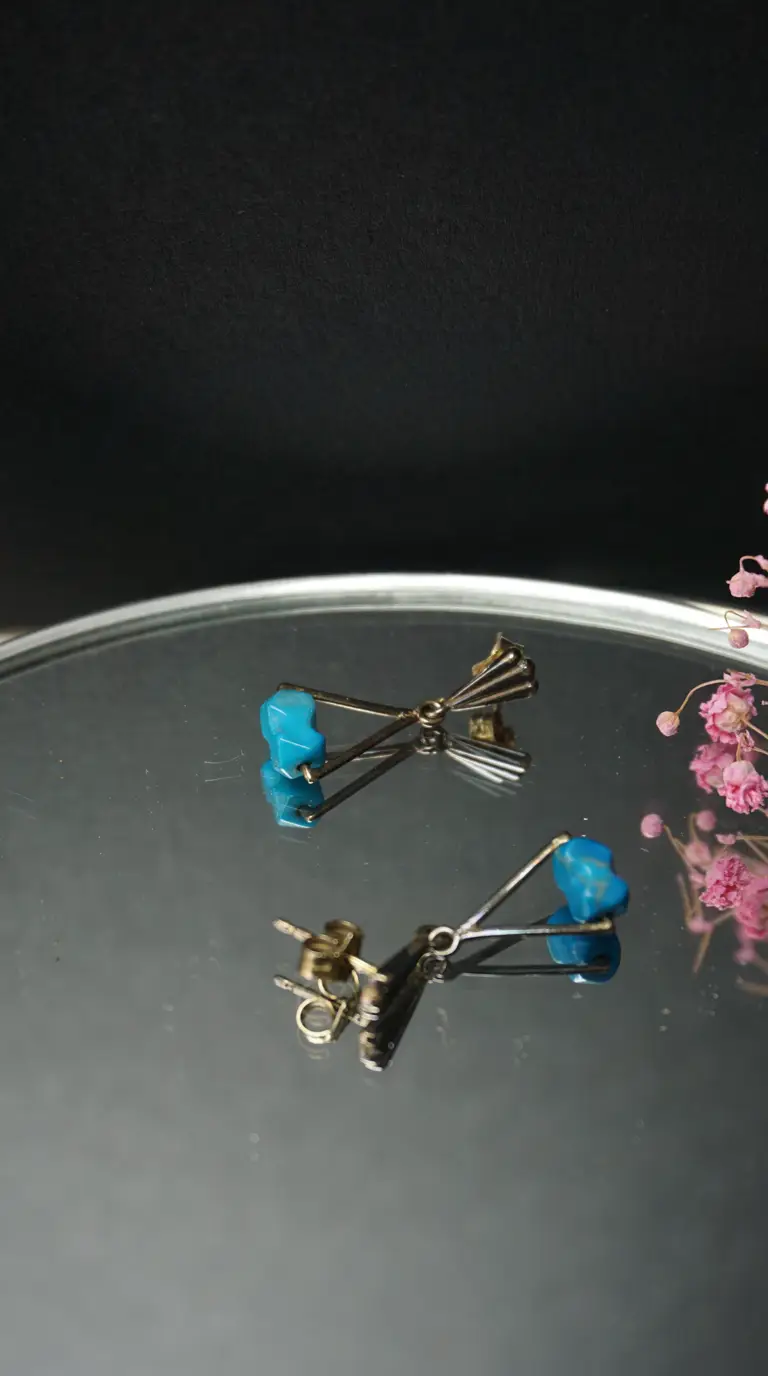 Vintage silver-tone dangle earrings with turquoise stones