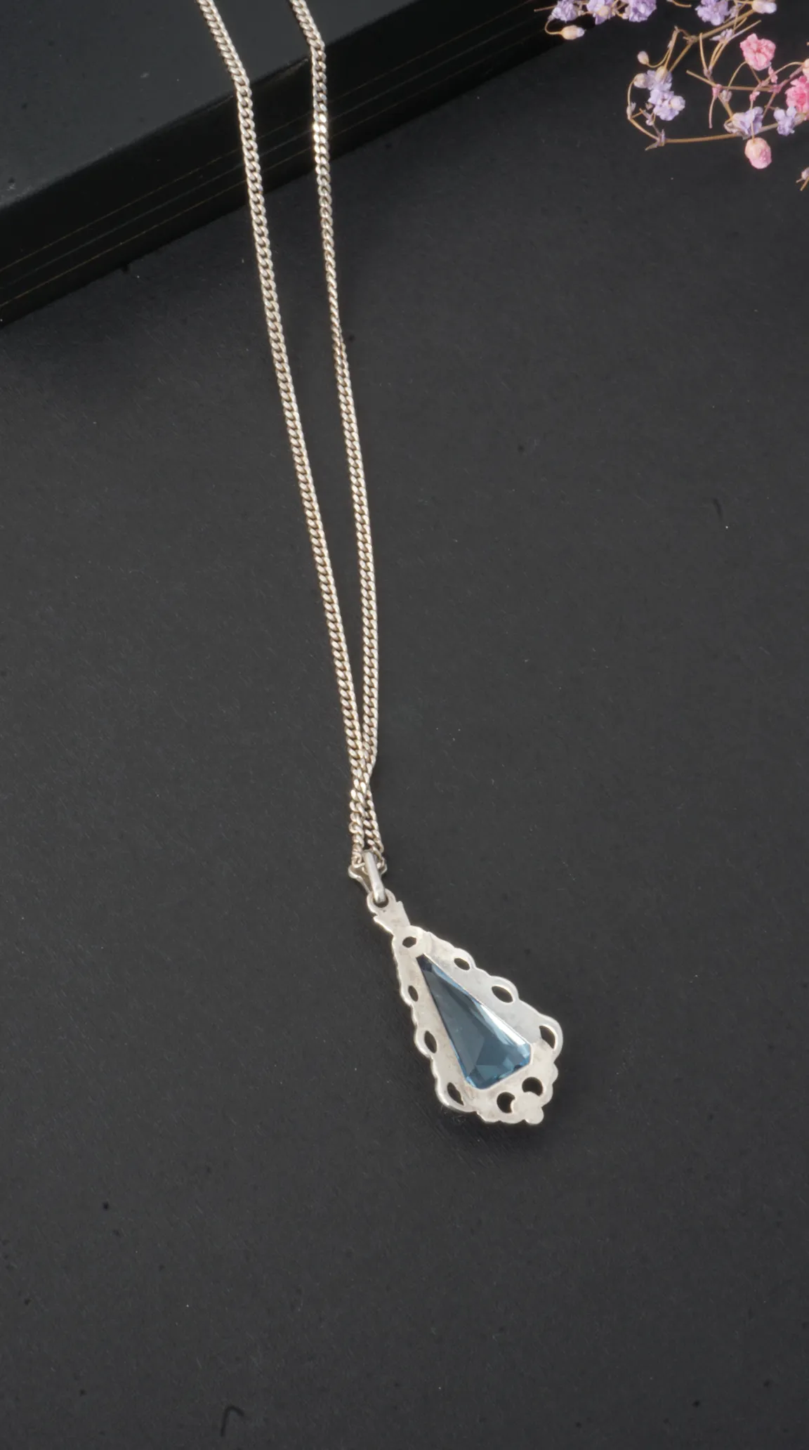 Vintage silver filigree necklace with blue triangular gemstone pendant
