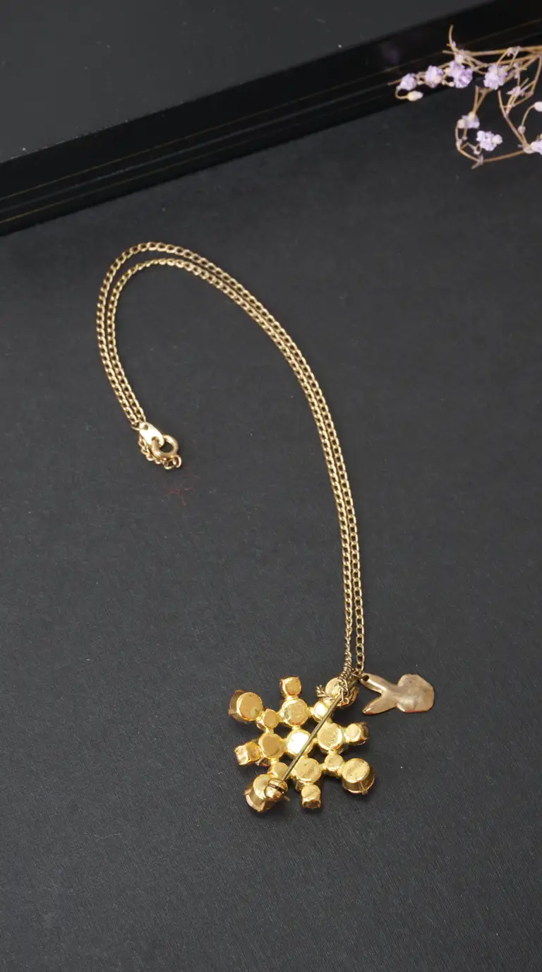 Vintage gold tone snowflake brooch necklace with bunny charm, repurposed jewelry.