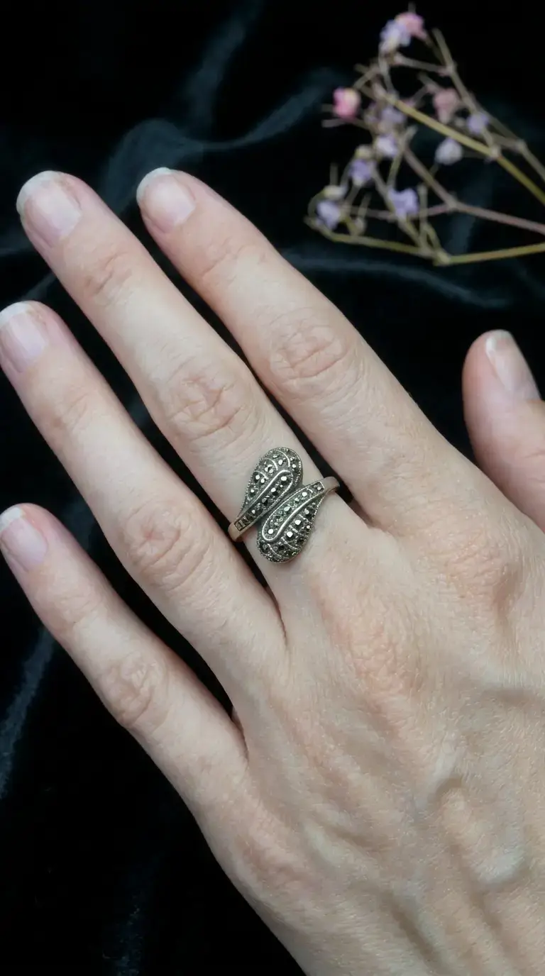 Vintage silver marcasite ring with serpentine wrap design