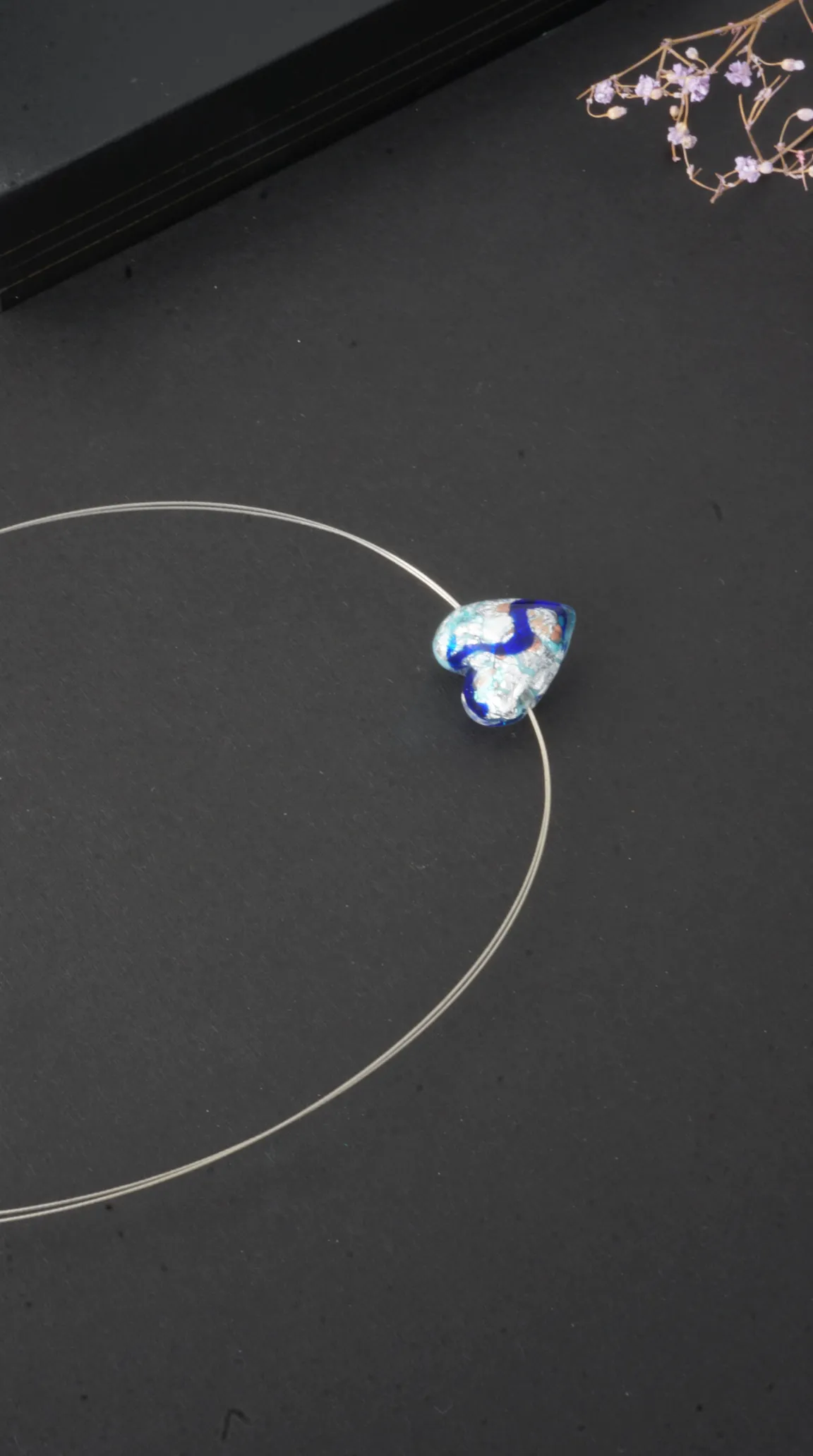 Vintage blue and silver abstract heart pendant necklace on clear cord