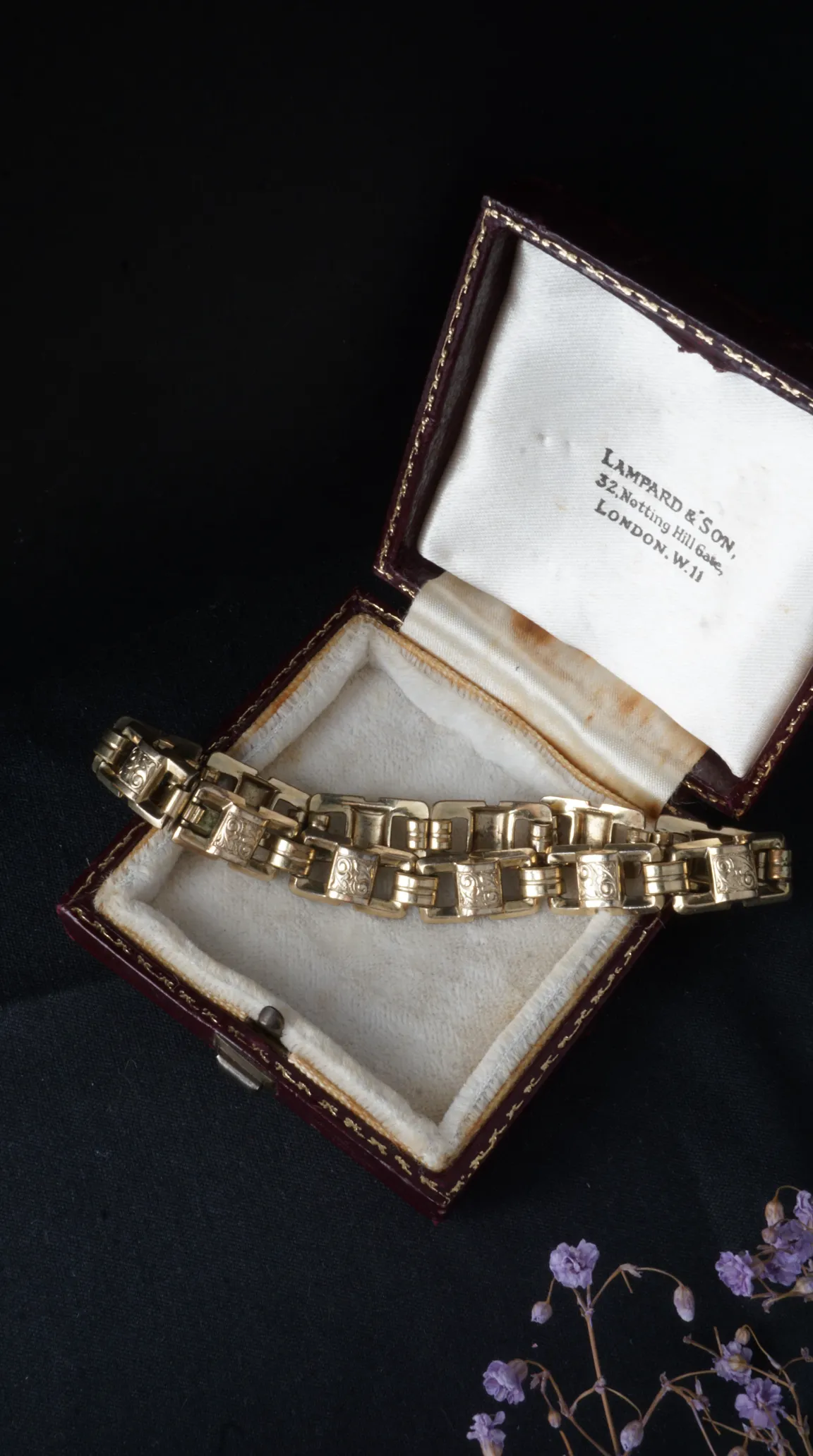 Vintage gold link bracelet with engraved details in antique Lampard & Son jewelry box