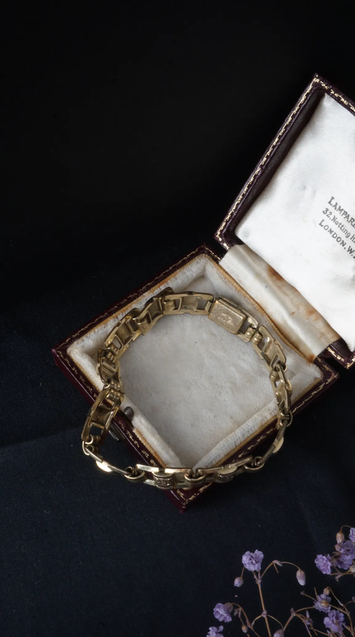 Vintage gold link bracelet in antique Lamparde Notting Hill London jewelry box