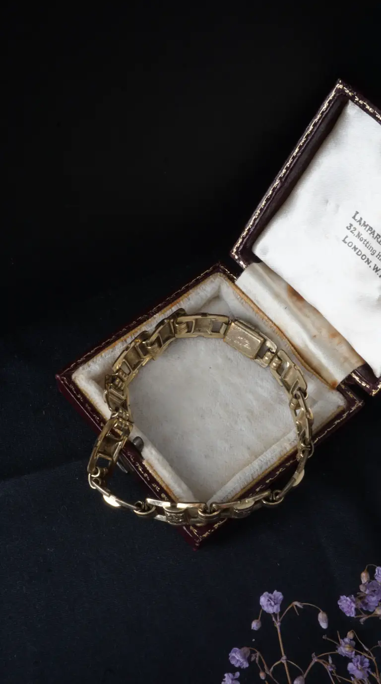 Vintage gold link bracelet in antique Lamparde Notting Hill London jewelry box