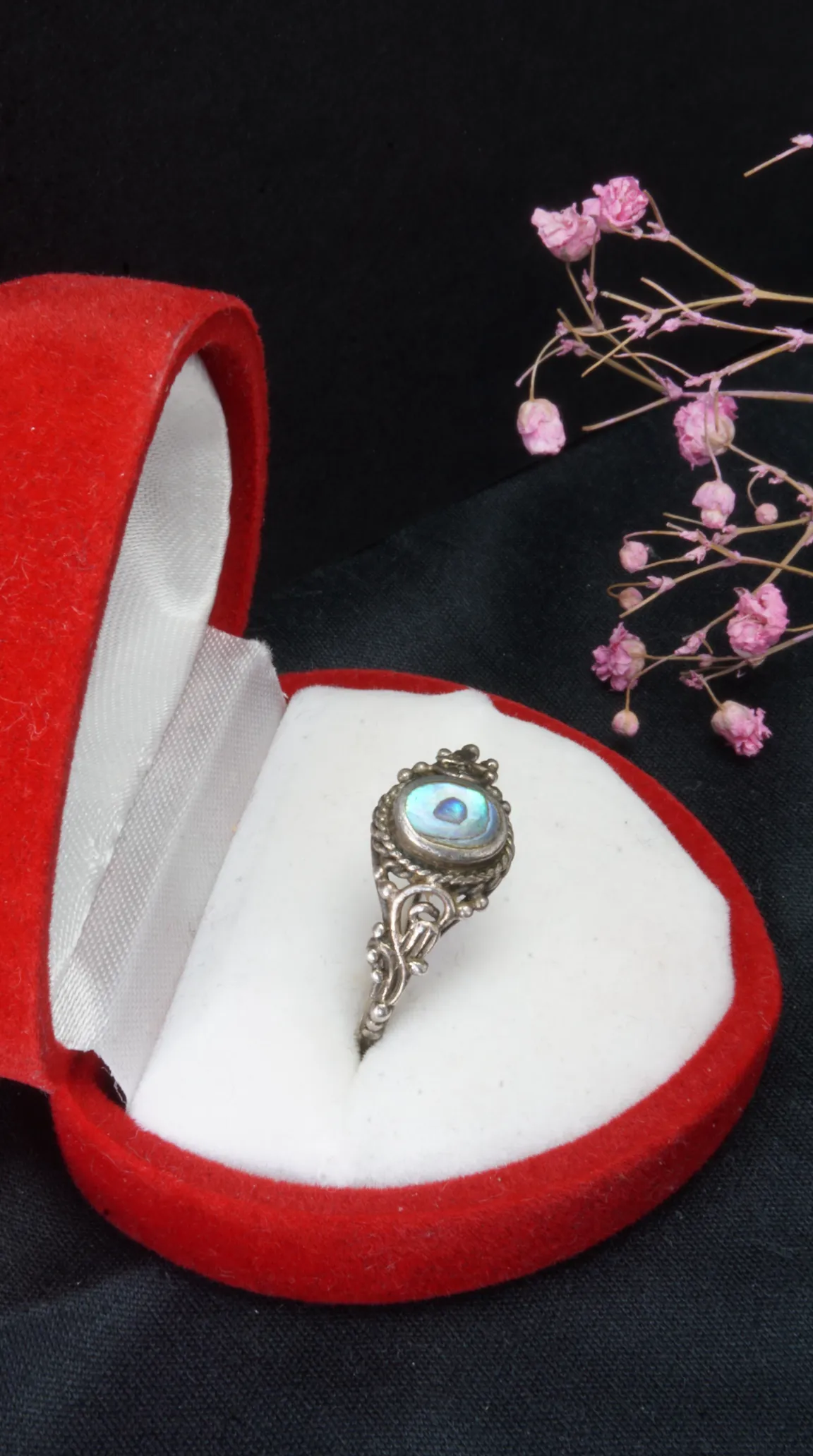Vintage sterling silver abalone ring with ornate filigree details in red heart jewelry box