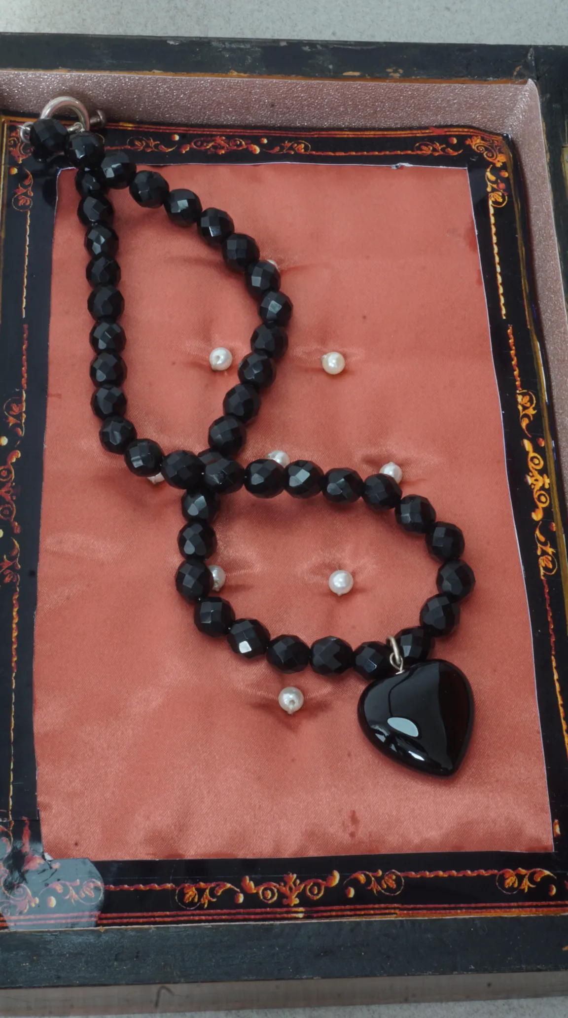 Vintage black faceted bead necklace with polished black heart pendant