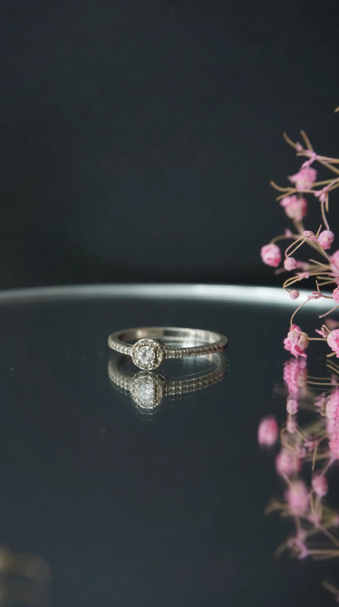 Vintage silver halo diamond ring with textured band