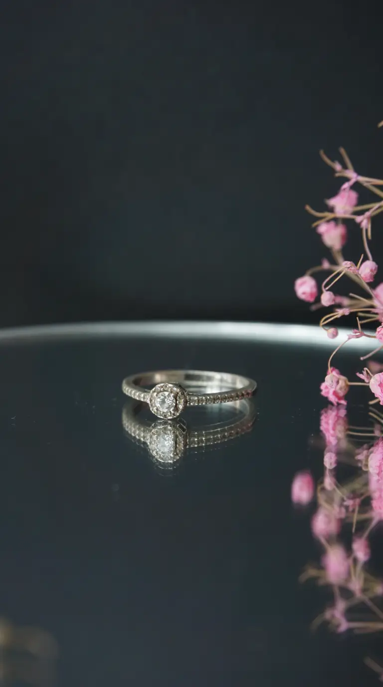 Vintage silver halo diamond ring with textured band