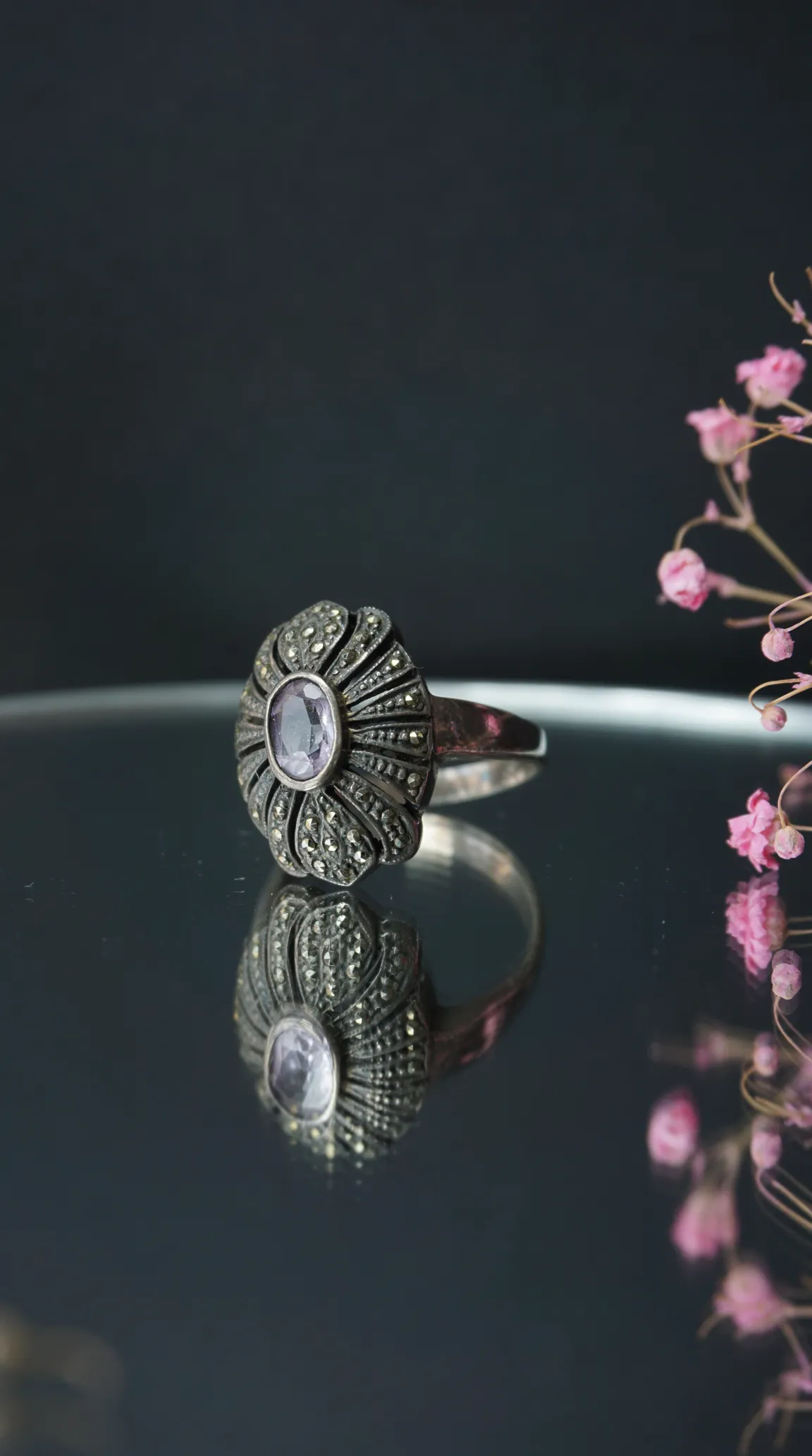 Vintage Art Deco style silver marcasite ring with oval purple amethyst gemstone